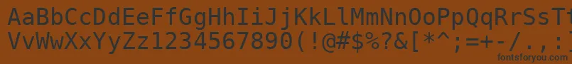 Czcionka Dejavu – czarne czcionki na brązowym tle