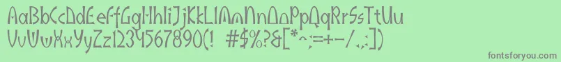 フォントAkaindic – 緑の背景に灰色の文字