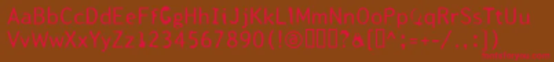 Tjackluder Font – Red Fonts on Brown Background
