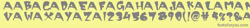 フォントScary – 黄色の背景に灰色の文字