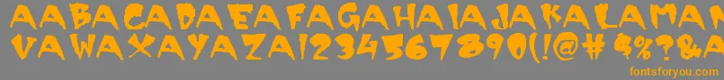 フォントScary – オレンジの文字は灰色の背景にあります。