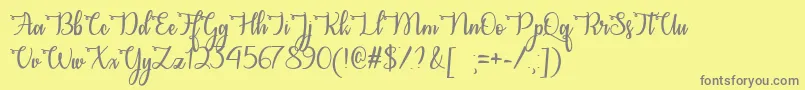 フォントCongratsCalligraphyTtf – 黄色の背景に灰色の文字