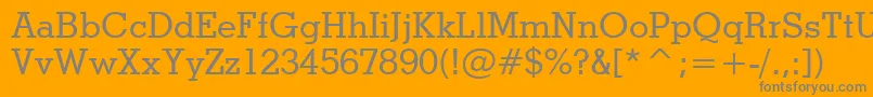 StymieMediumBt-fontti – harmaat kirjasimet oranssilla taustalla