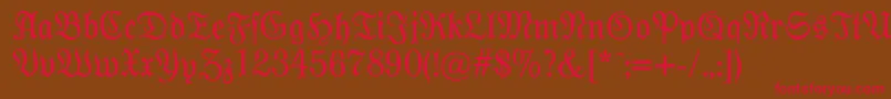 フォントModernefraktur – 赤い文字が茶色の背景にあります。