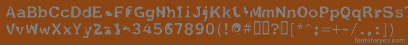 Fildnik-Schriftart – Graue Schriften auf braunem Hintergrund