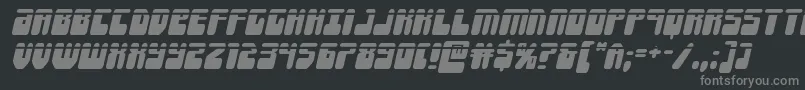 Forcemajeurelaserital-fontti – harmaat kirjasimet mustalla taustalla