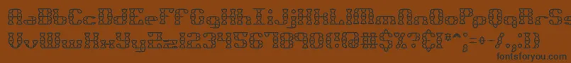 BrassKnuckleStarBrk Font – Black Fonts on Brown Background