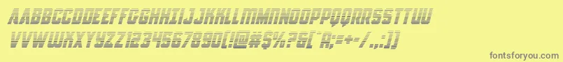 Antillesgradital-fontti – harmaat kirjasimet keltaisella taustalla