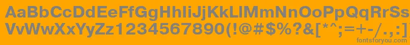 Prg75C-fontti – harmaat kirjasimet oranssilla taustalla