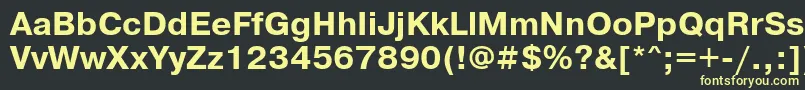 フォントPrg75C – 黒い背景に黄色の文字
