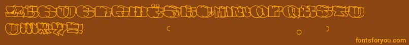Spew Font – Orange Fonts on Brown Background