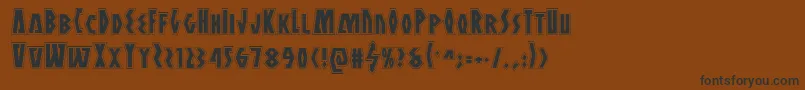 フォントAntikytheraacad – 黒い文字が茶色の背景にあります