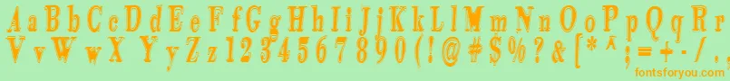 フォントTidekopr – オレンジの文字が緑の背景にあります。