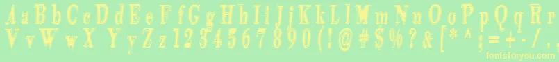 フォントTidekopr – 黄色の文字が緑の背景にあります