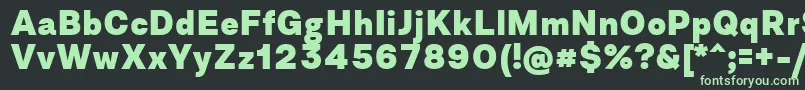 AsketExtrabold-fontti – vihreät fontit mustalla taustalla