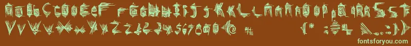 Glifos-fontti – vihreät fontit ruskealla taustalla