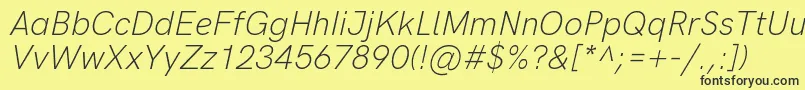 Fonte HkgroteskLightlegacyitalic – fontes pretas em um fundo amarelo