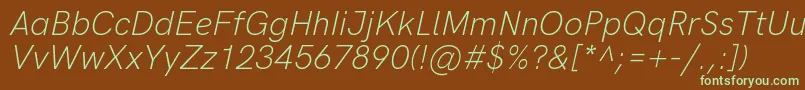 Fonte HkgroteskLightlegacyitalic – fontes verdes em um fundo marrom