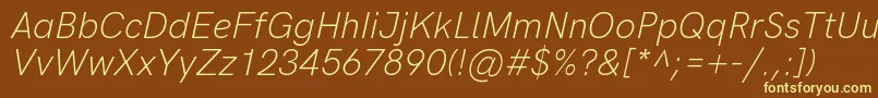 Czcionka HkgroteskLightlegacyitalic – żółte czcionki na brązowym tle