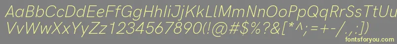 Шрифт HkgroteskLightlegacyitalic – жёлтые шрифты на сером фоне