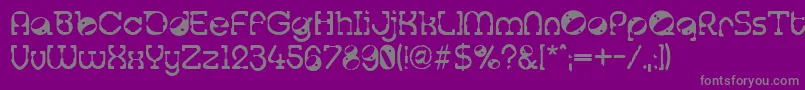 フォントTralfamadore – 紫の背景に灰色の文字