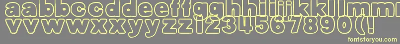 DjbBellyButtonOuttie Font – Yellow Fonts on Gray Background