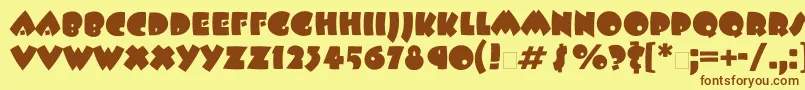 Beeskneesett Font – Brown Fonts on Yellow Background