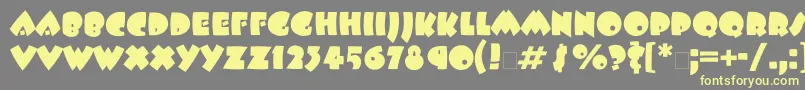 Beeskneesett Font – Yellow Fonts on Gray Background