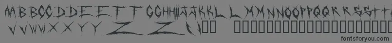 フォントDeadbitchRegular – 黒い文字の灰色の背景