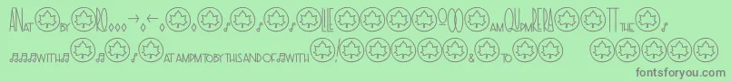TheraSymbolsandligatures2 Font – Gray Fonts on Green Background