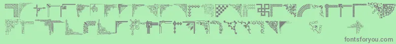 Cornpop-fontti – harmaat kirjasimet vihreällä taustalla