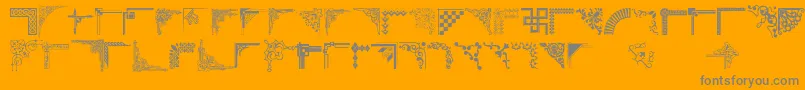 Cornpop-fontti – harmaat kirjasimet oranssilla taustalla
