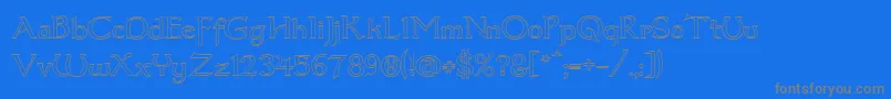 フォントDumbledor3Outline – 青い背景に灰色の文字