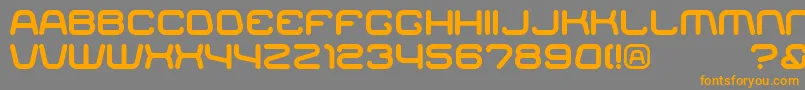 フォントRacer – オレンジの文字は灰色の背景にあります。