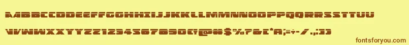 フォントPolicecruiserlas – 茶色の文字が黄色の背景にあります。