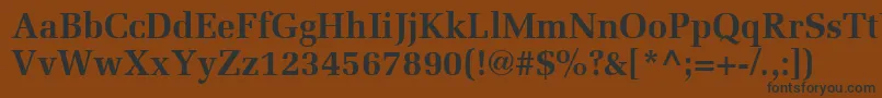 フォントMeliorLtBold – 黒い文字が茶色の背景にあります