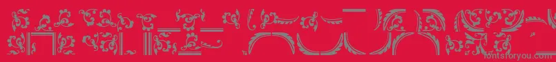 フォントOrnamentstwosskRegular – 赤い背景に灰色の文字