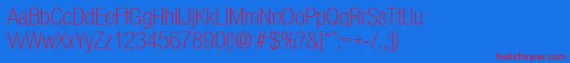 OlnovaLightcond-Schriftart – Rote Schriften auf blauem Hintergrund