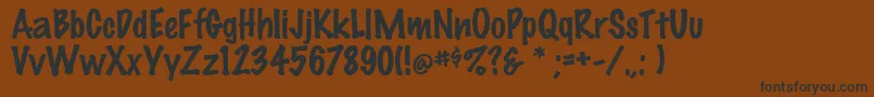 FeltRegular Font – Black Fonts on Brown Background