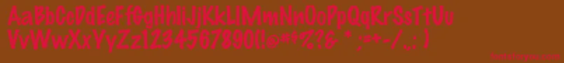 フォントFeltRegular – 赤い文字が茶色の背景にあります。