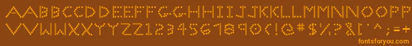 Spangledmast Font – Orange Fonts on Brown Background