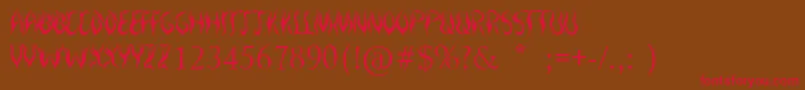 フォントRoyalInferno – 赤い文字が茶色の背景にあります。