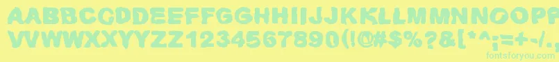 Huhtikuu2-Schriftart – Grüne Schriften auf gelbem Hintergrund