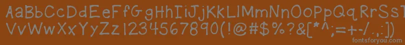 Kbplaydate Font – Gray Fonts on Brown Background