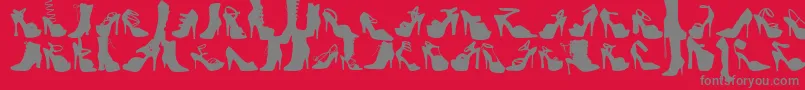 Fonte Wcfetishbta – fontes cinzas em um fundo vermelho
