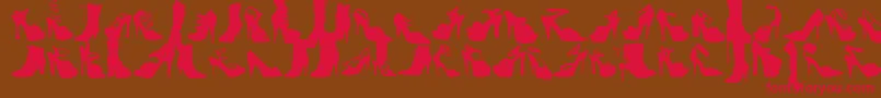 Wcfetishbta Font – Red Fonts on Brown Background