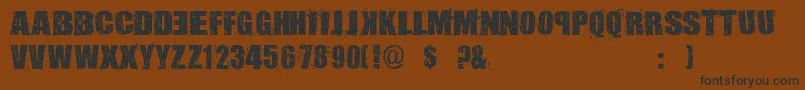 AssassinsDub Font – Black Fonts on Brown Background