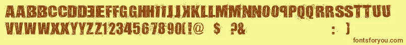 AssassinsDub-Schriftart – Braune Schriften auf gelbem Hintergrund