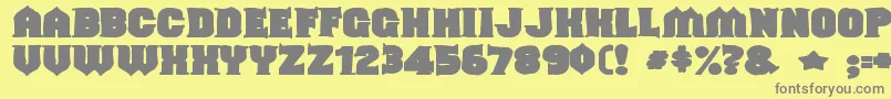 Shouldveknownink-Schriftart – Graue Schriften auf gelbem Hintergrund