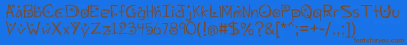 Starrynight Font – Brown Fonts on Blue Background